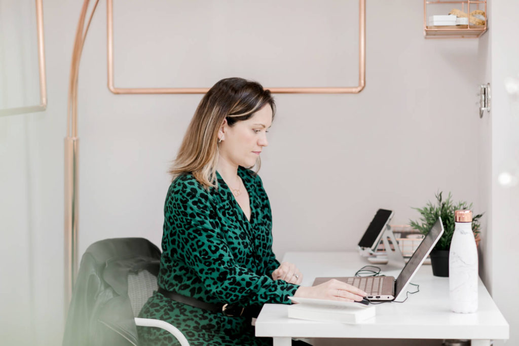 Personal Brand Photo, woman at her desk, workin, tiping, laptop