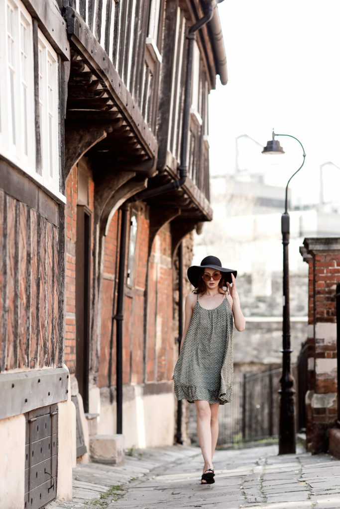 blogger walking in Southampton, sun hat, summer dress, content photographs